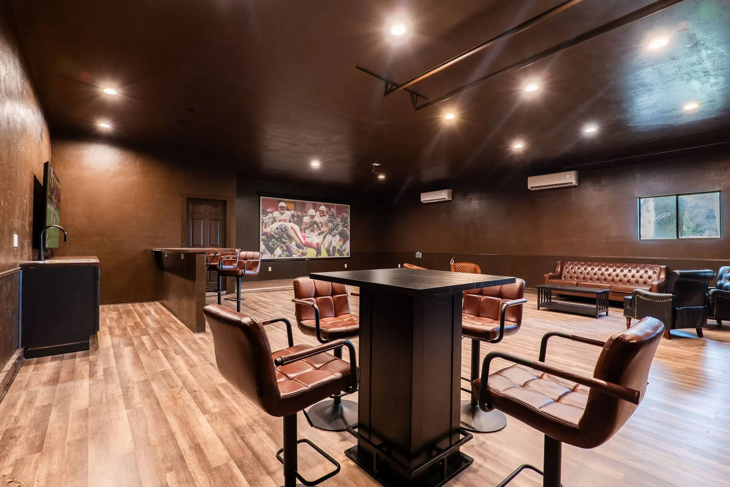A game table and lounge at Flossmoore in Mesa